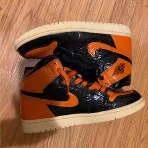 Black and Orange Jordan High-Top Sneakers